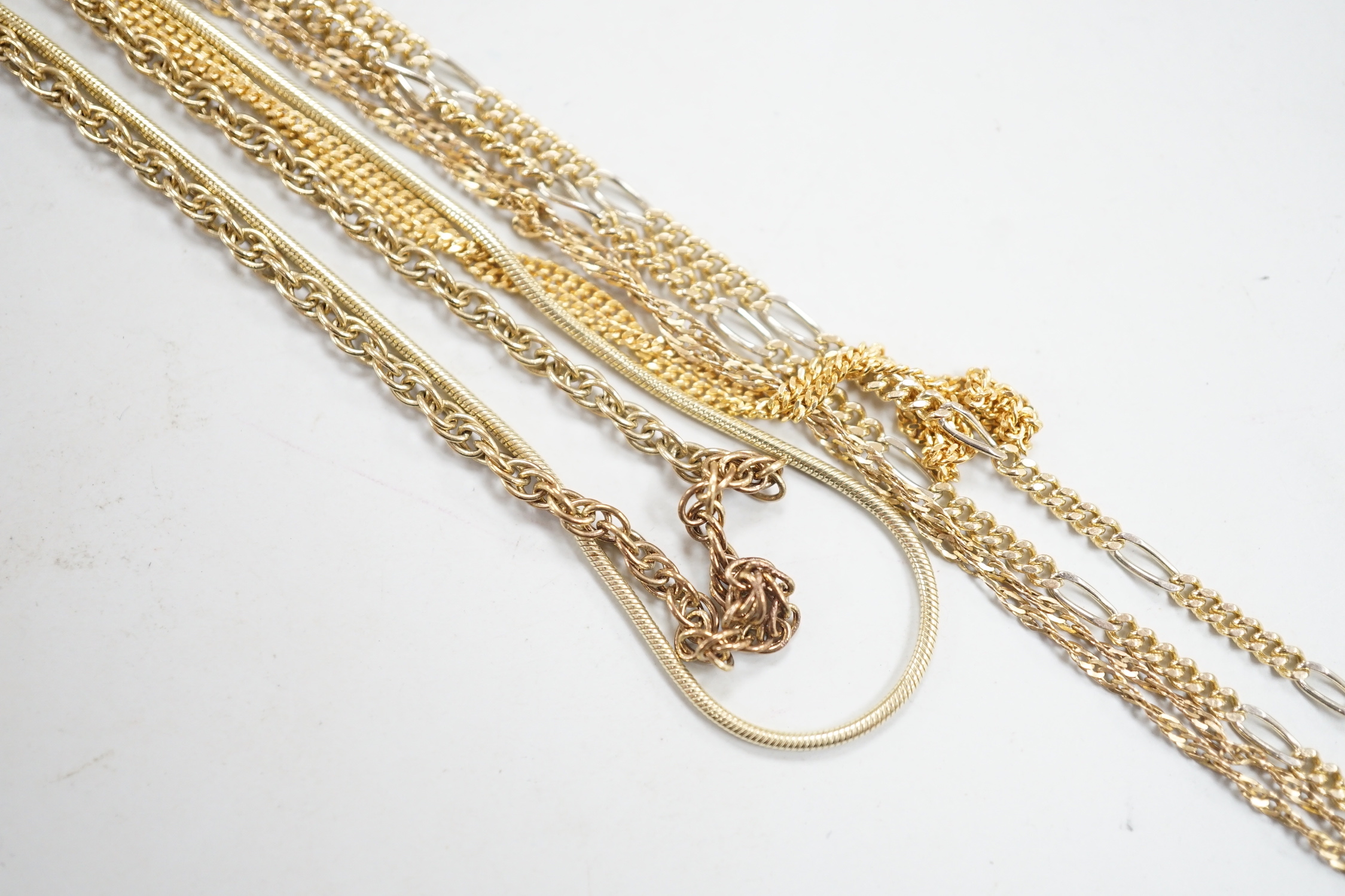 Five assorted modern 9ct gold chains including one two colour, longest 55cm, 16.6 grams.